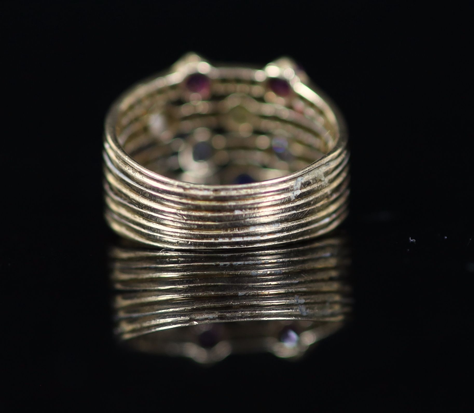 A mid 20th century gold, ruby, diamond sapphire and seed pearl set quadruple shank dress ring